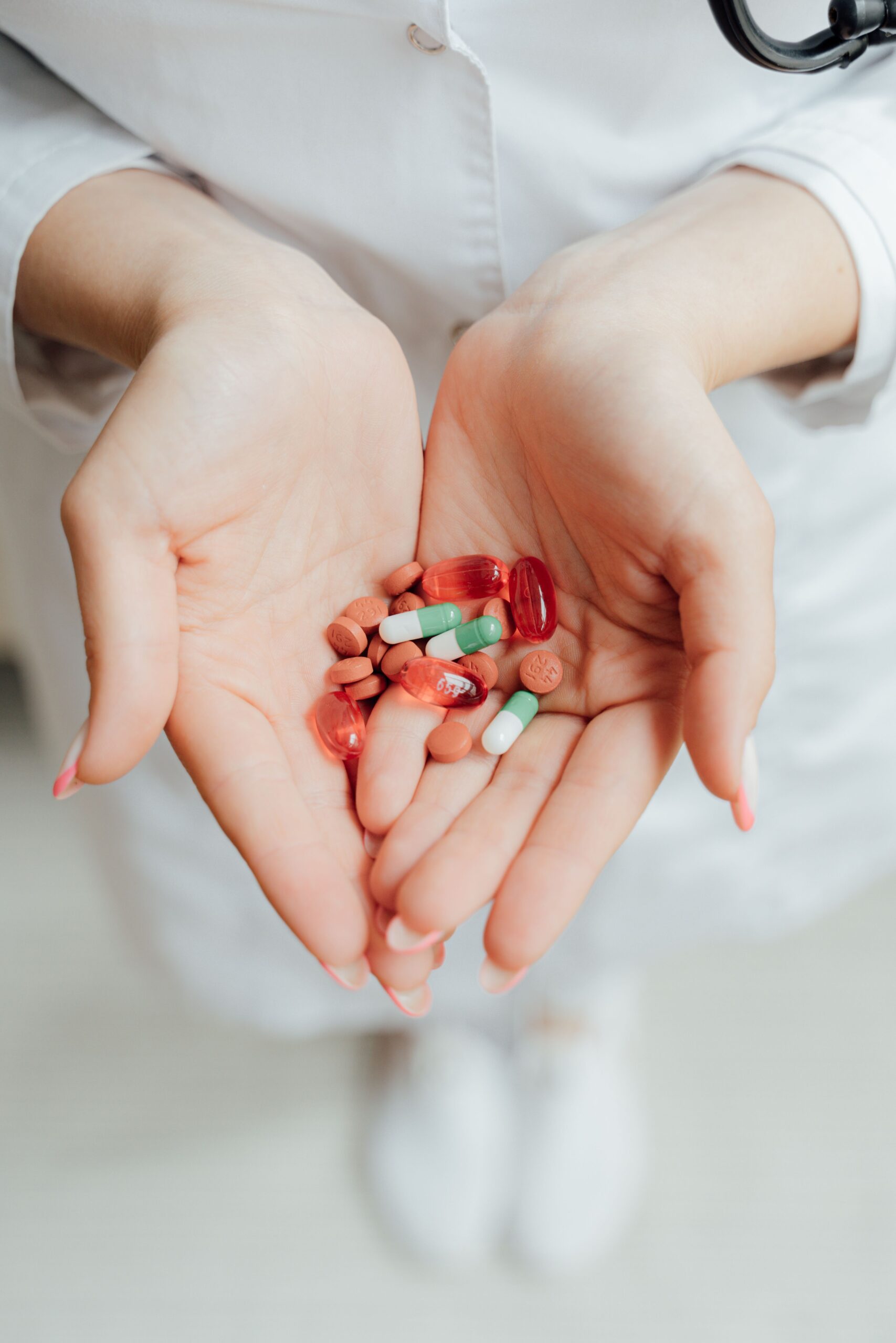 Hands holding medication.